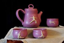 Orchid tea set with yoga figures